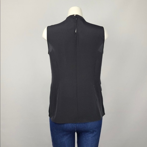 Cascading ruffles sleeveless blouse - Picture 4 of 6